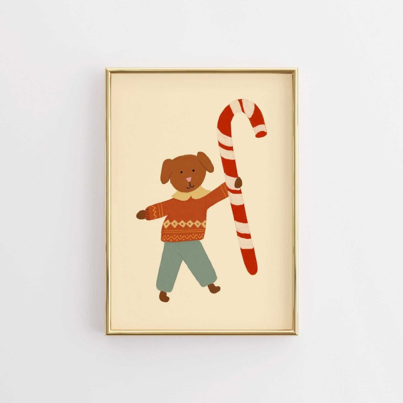 Cucciolo di Natale con bastoncino di zucchero